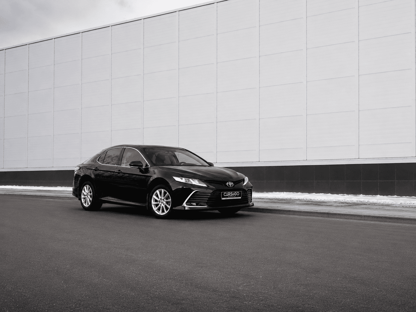 wide_outdoor_automotive_photography_scene_a_sleek